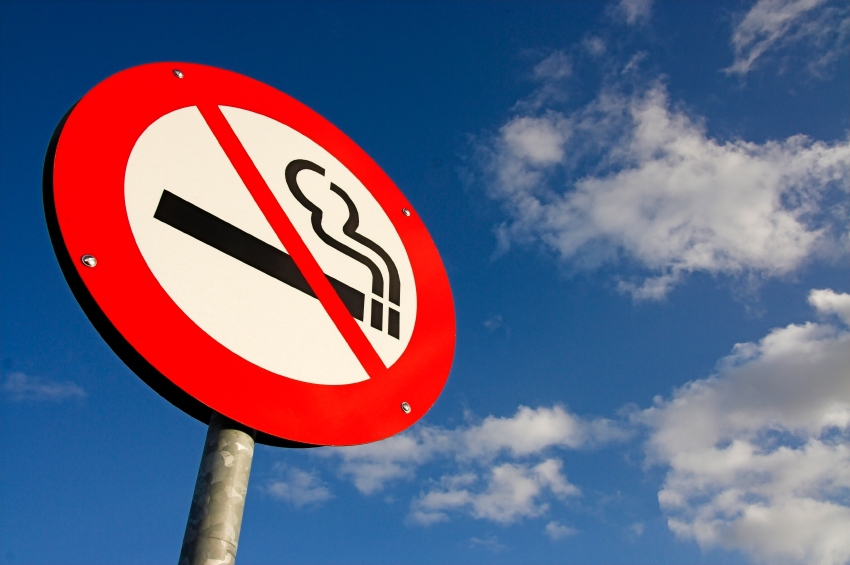 no smoking sign against the blue sky