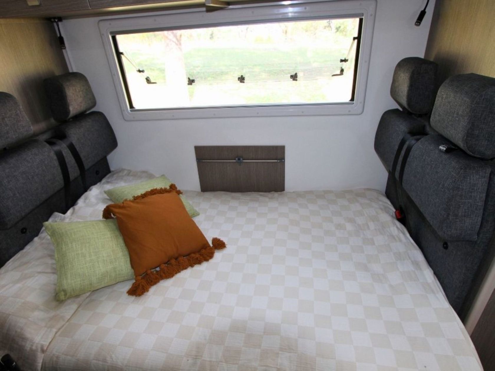 Leisure rent 6 Deluxe Motorhome dinette bed | Campers Down Under